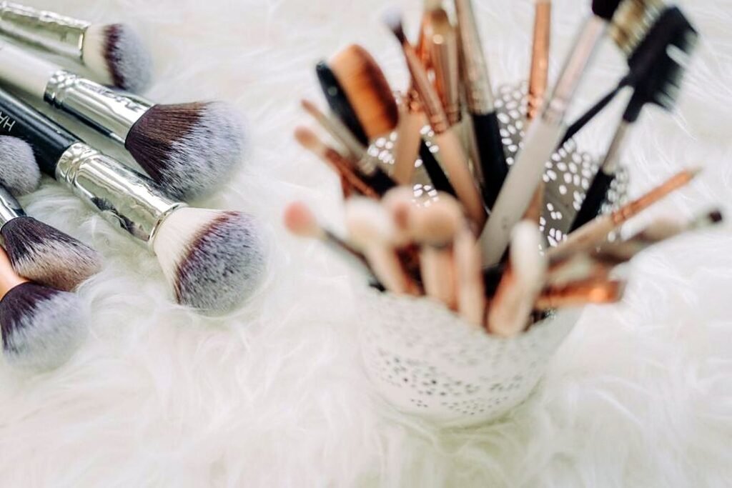Makeup brushes in a white holder